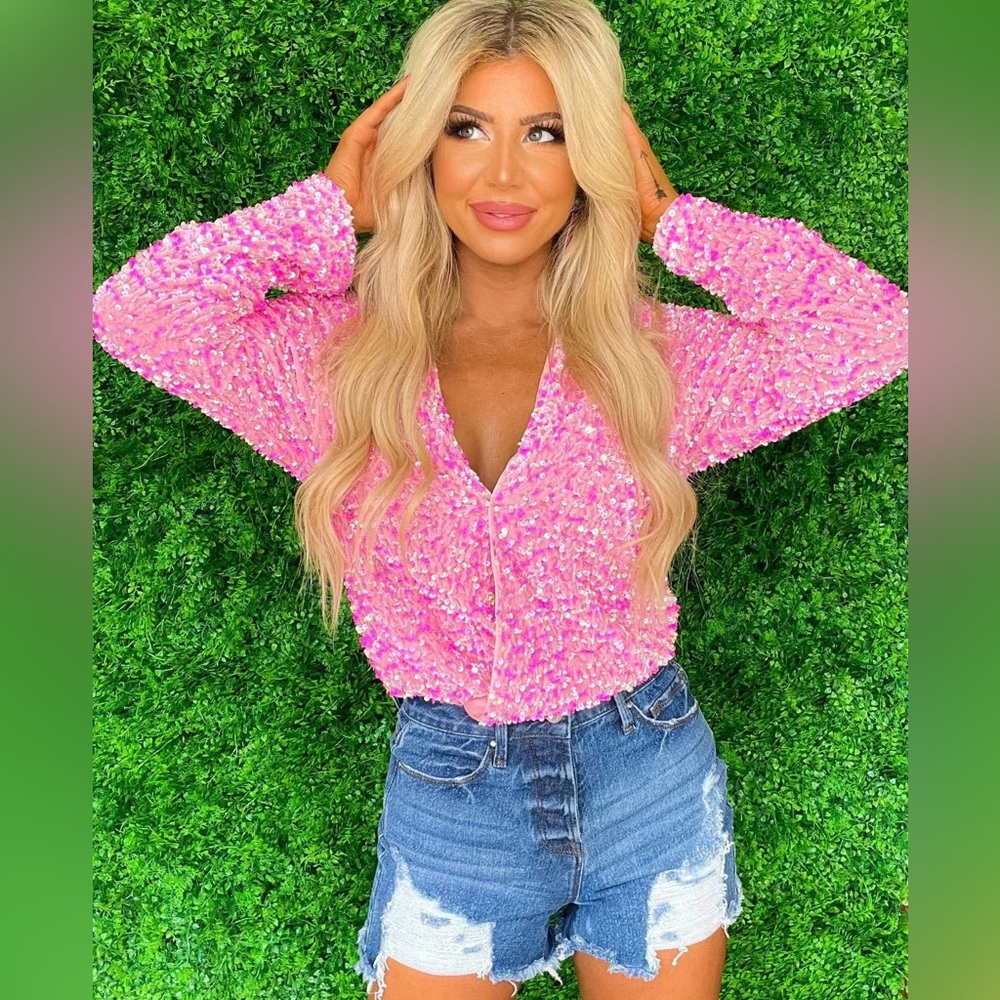 Pink long sleeve sequin body suit